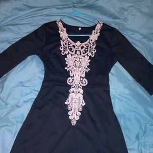 Dress, size 8, black and white lace, sleeved, knee high